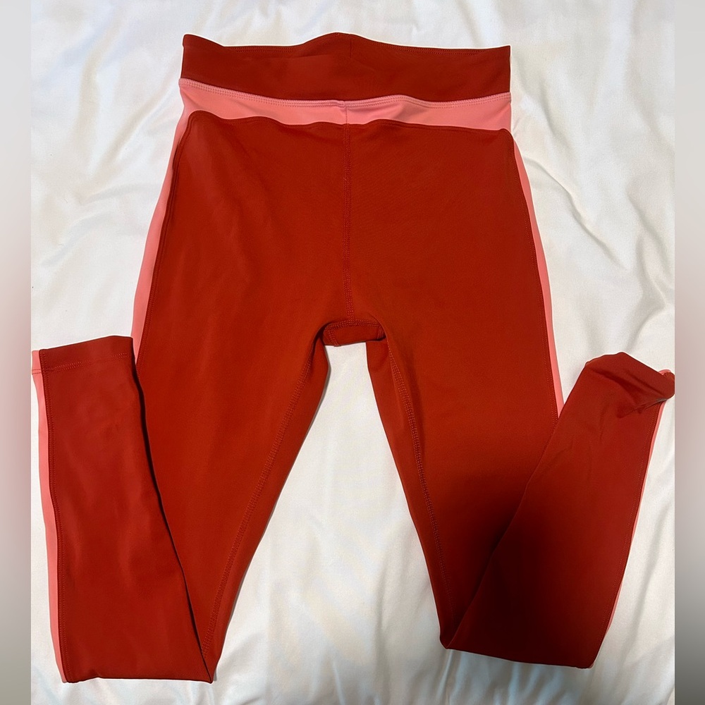 SPLITS59 pink and orange striped leggings sized medium
